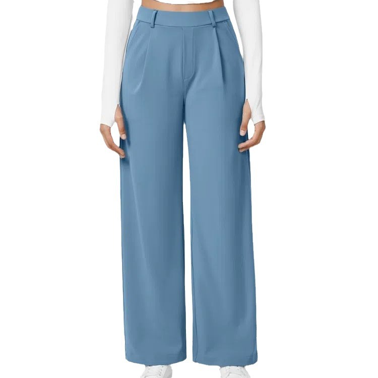 Blue wide-leg pants worn by a person on a white background