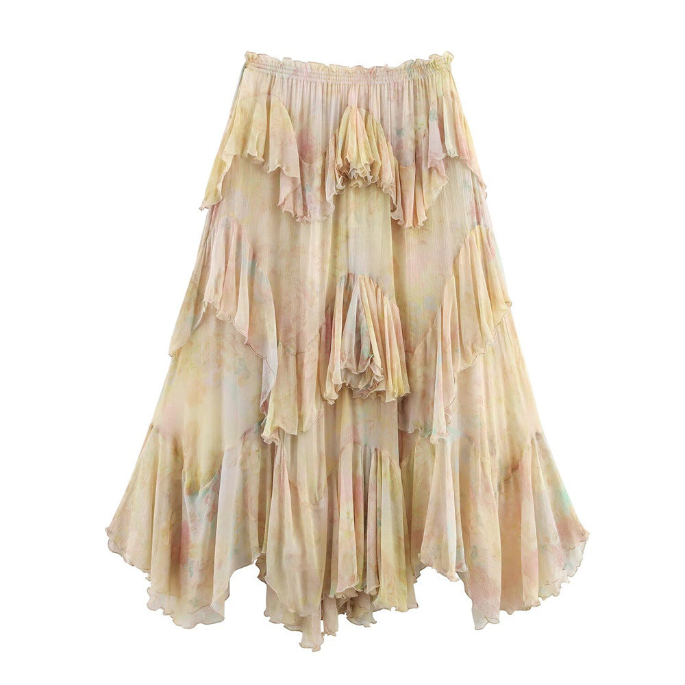 Long, layered skirt with a pastel color palette on a white background