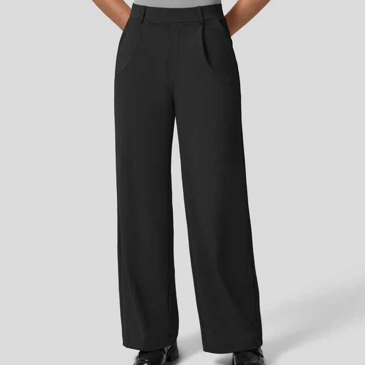 Black wide-leg pants worn by a person on a light gray background