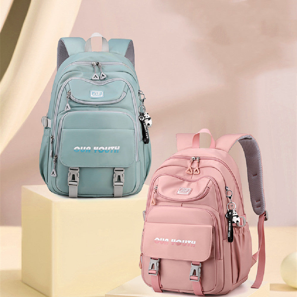 Two backpacks, one blue and one pink