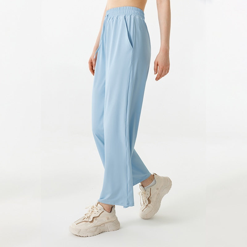 Light blue pants worn by a person on a white background