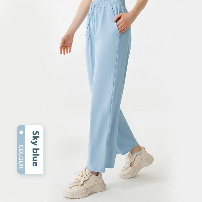 Light blue pants worn by a person on a white background