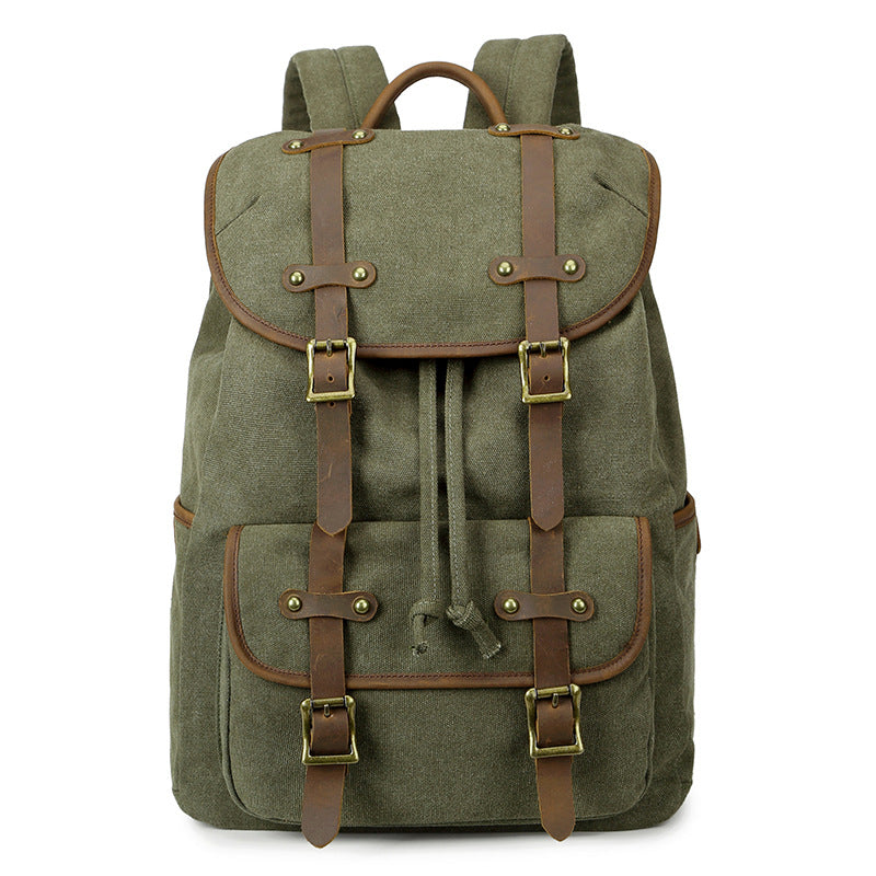 Green backpack with brown leather straps