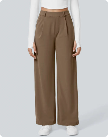 Brown wide-leg pants worn by a person on a light gray background