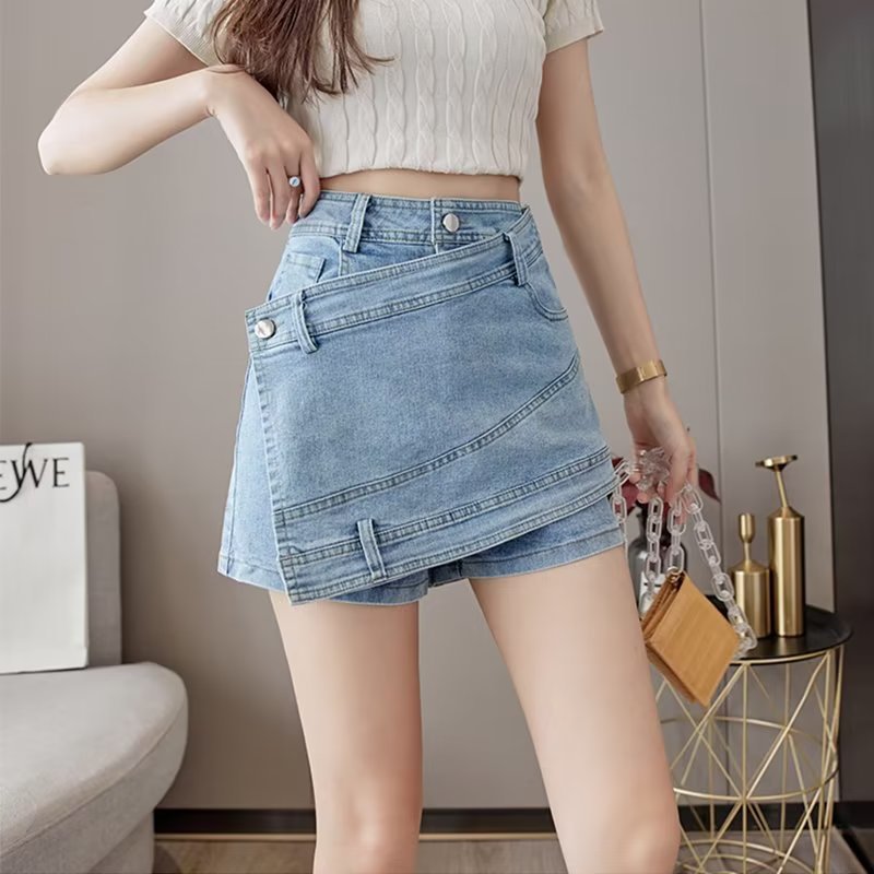 Woman wearing a light blue denim skirt indoors
